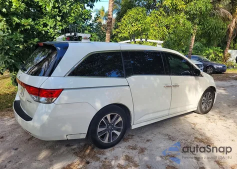 2016 Honda Odyssey Touring z USA, uszkodzony, nr VIN 5FNRL5H95GB073312